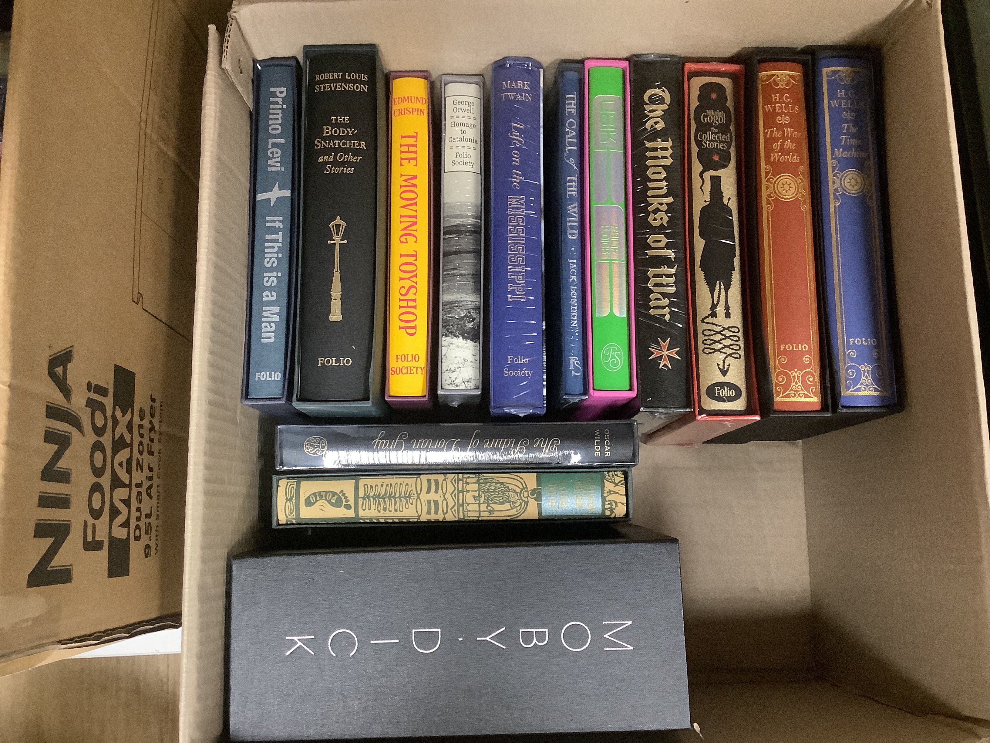 Twenty six Folio Society books, all fiction, including Moby Dick; The Picture of Dorian Gray; The Moving Toyshop; Wells, The War of the Worlds; The Time Machine, etc.